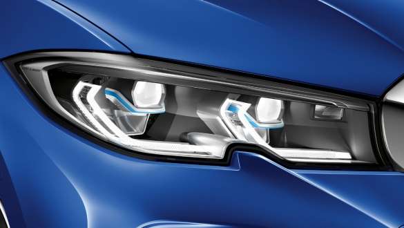 BMW 3 serijos sedanas (G20), BMW <i>Laserlight</i> lazeriniai žibintai BMW 3 serijos sedanas (G20), BMW <i>Laserlight</i> lazeriniai žibintai Kairiojo priekinio žibinto su BMW <i>Laserlight</i> priartintas vaizdas iš šono.