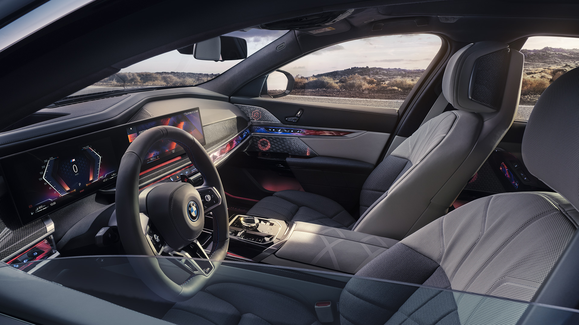 My Mode Sport BMW M760e xDrive sedanas G70 My Mode Sport BMW M760e xDrive sedanas G70 vaizdas iš išorės į vidų per pusiau nuleistą lango stiklą