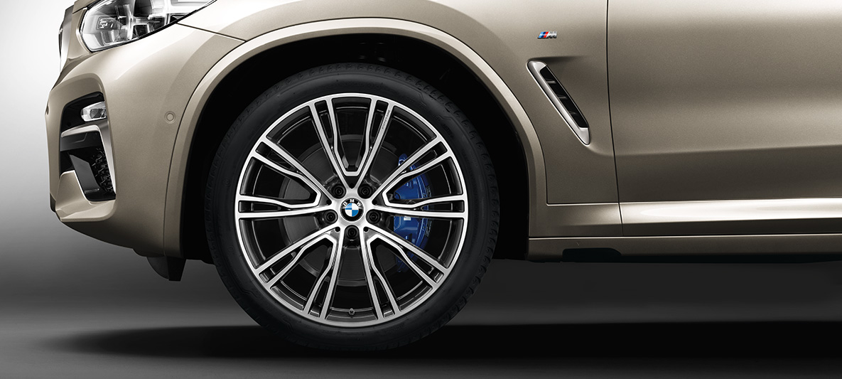 21 colio BMW Individual lengvojo lydinio ratlankiai V-spoke 726 I BMW X4 21 colio BMW Individual lengvojo lydinio ratlankiai V-spoke 726 I BMW X4 G02 2018 Sun Stone metaliko spalvos vaizdas iš šono