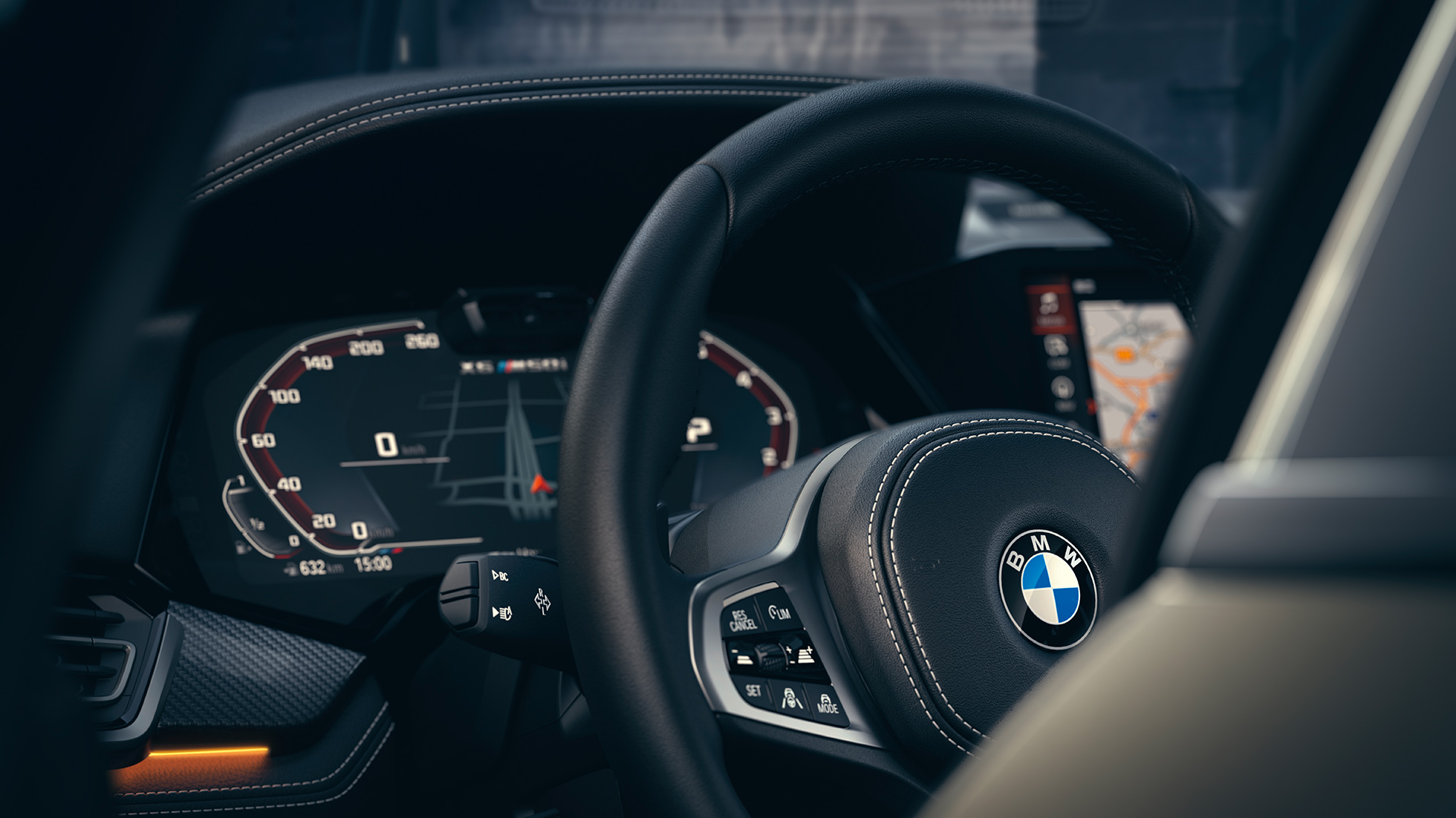 BMW pagalbos sistemos BMW interjeras su prietaisų skydeliu iš arti