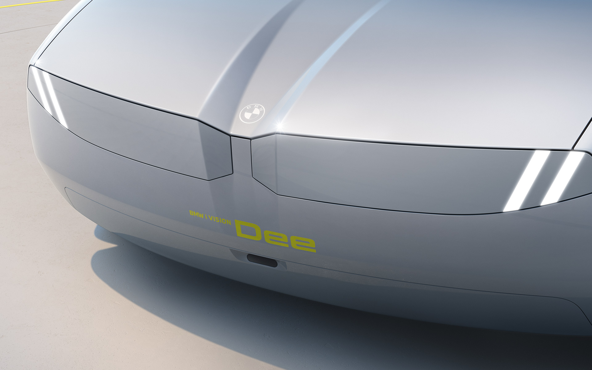 BMW i Vision Dee Vision automobilio eksterjero dizaino vaizdas iš priekio Žibintai ir BMW priekinės grotelės sukuria vientisą grafinį paviršių.