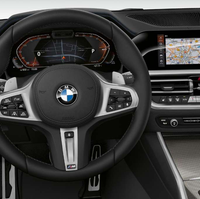 BMW 3 serijos sedano su Sport Line modelio funkcijomis vairuotojo erdvės priartintas vaizdas iš priekio.